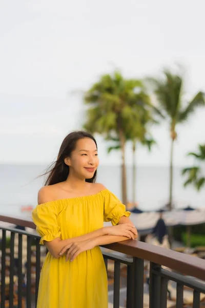 Portrait beautiful asian women happy smile relax on the tropical