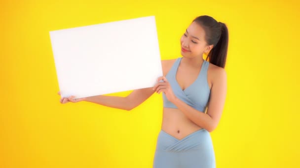 Footage Beautiful Young Asian Woman Holding Blank White Board Isolated — Stock Video