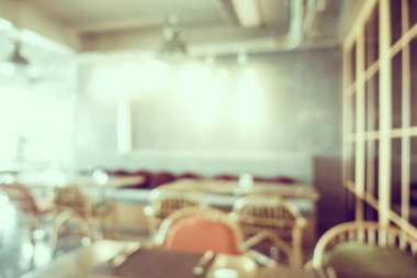 Arka plan için soyut bulanıklık ve kahve dükkanı ve restoran iç mekanı.