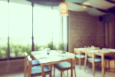 Arka plan için soyut bulanık kahve dükkanı ve restoran iç mekanı