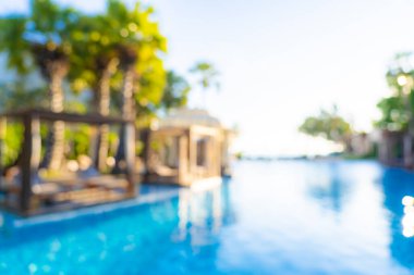 Seyahat ve tatil geçmişi için otel tatil beldesinde soyut bulanıklık ve açık yüzme havuzu