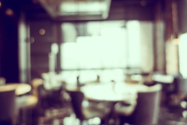 Arka plan için soyut bulanıklık ve odaklanmış kahve dükkanı ve restoran iç mekanı