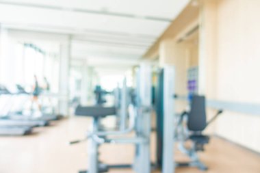 Beden eğitimi odasının içinde arka plan için soyut bulanıklık çözücü fitness ekipmanı
