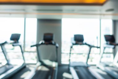 Beden eğitimi odasının içinde arka plan için soyut bulanık fitness ekipmanı