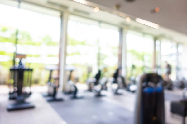 Abstract blur fitness equipment object in gym interior room for background