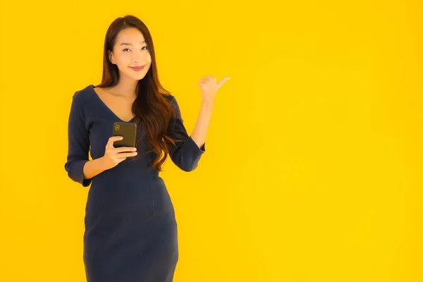 Portrait Beautiful Young Asian Woman Smart Mobile Phone Cellphone Yellow — Stock Photo, Image