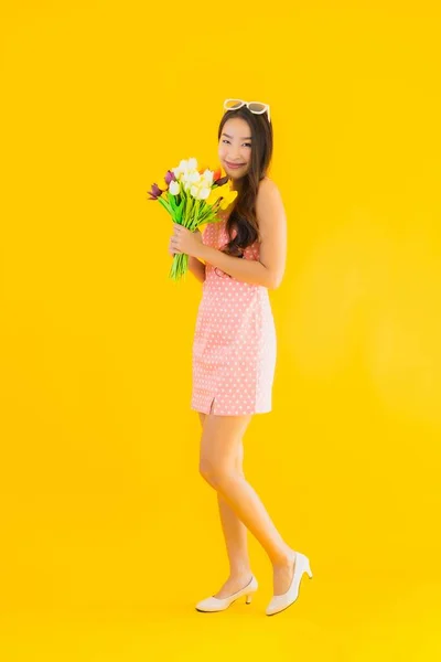 Portrait Beautiful Young Asian Woman Colorful Flower Yellow Isolated Background — Stock Photo, Image