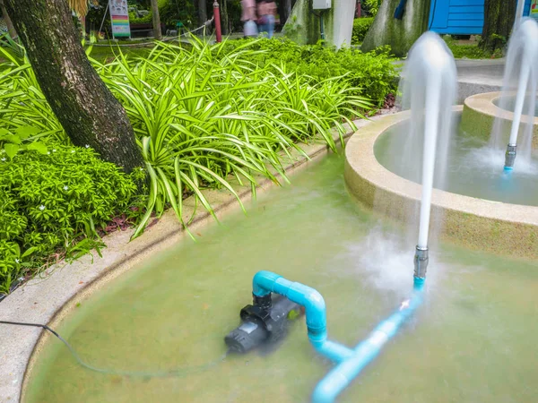 Water pump up in the park,water From the Plastic pipe,Water in the poo