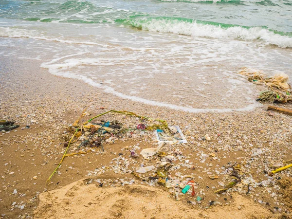 Garbage on Beautiful Beach,Environment pollution in Travel high season,Concept pictur