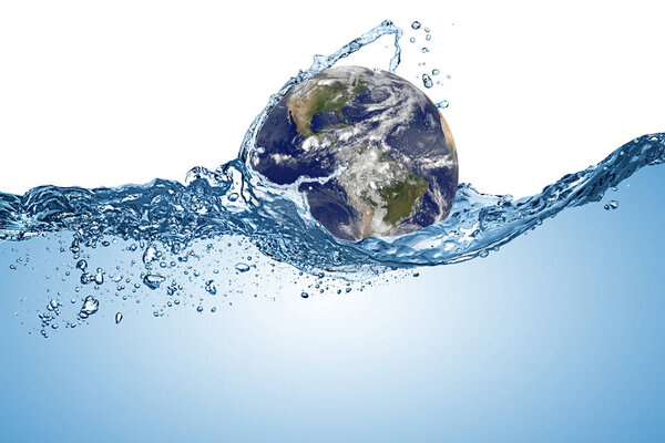 планета Земля земной шар в волне воды в океане. Изменение климата
