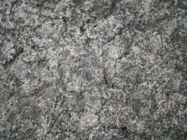 Küçük kırıntıları ile beton agrega yapılmış gri duvar, görünümü kapatın.