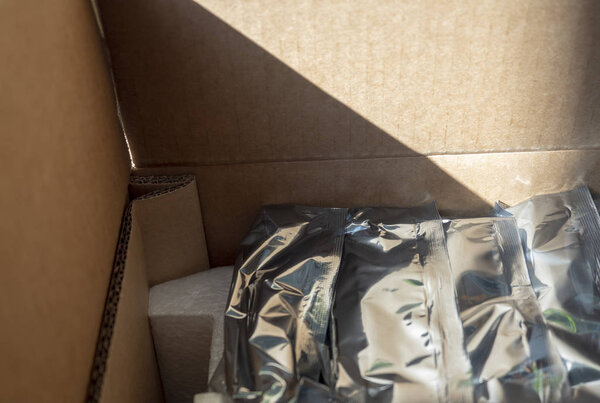 Packed hard drives are in a cardboard box