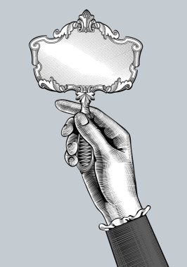 Woman's hand with a retro mirror. Vintage engraving stylized drawing. Vector Illustration clipart