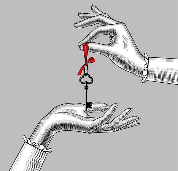 Las manos de la mujer con llave vieja — Vector de stock