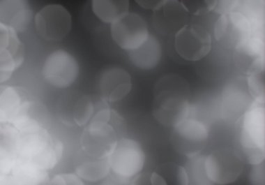 Bokeh soyut dokusu. Renkli. Odaklanmamış arka plan. Bulanık parlak ışık. Dairesel noktalar. 