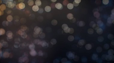 Bokeh soyut dokusu. Renkli. Odaklanmamış arka plan. Bulanık parlak ışık. Dairesel noktalar. 