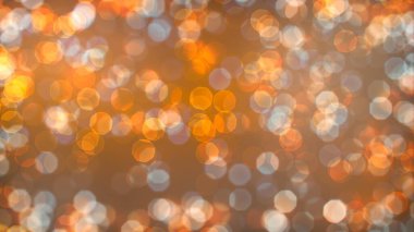 Bokeh soyut dokusu. Renkli. Odaklanmamış arka plan. Bulanık parlak ışık. Dairesel noktalar. 