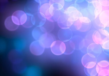 Bokeh soyut dokusu. Renkli. Odaklanmamış arka plan. Bulanık parlak ışık. Dairesel noktalar. 