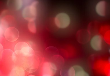 Bokeh soyut dokusu. Renkli. Odaklanmamış arka plan. Bulanık parlak ışık. Dairesel noktalar. 