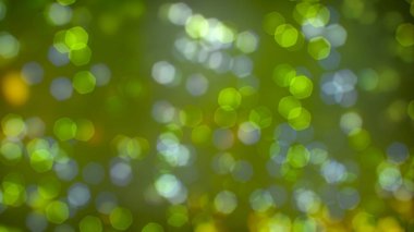 Bokeh soyut dokusu. Renkli. Odaklanmamış arka plan. Bulanık parlak ışık. Dairesel noktalar. 