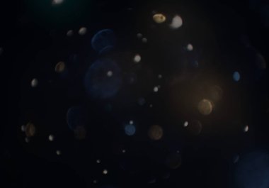 parlayan parlak bokeh toz