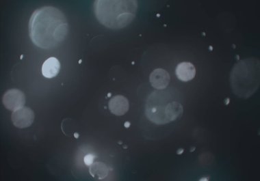 parlayan parlak bokeh toz