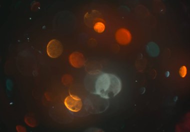 parlayan parlak bokeh toz