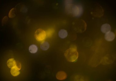 parlayan parlak bokeh toz