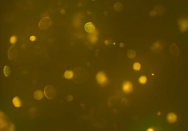 parlayan parlak bokeh toz parıltıları