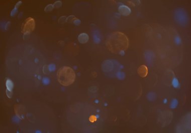 parlayan parlak bokeh toz parıltıları