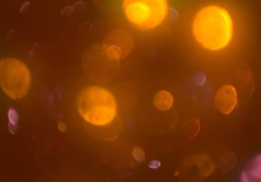 parlayan parlak bokeh toz parıltıları