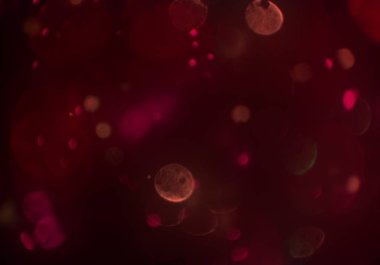 parlayan parlak bokeh toz parıltıları