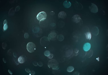 parlayan parlak bokeh toz parıltıları