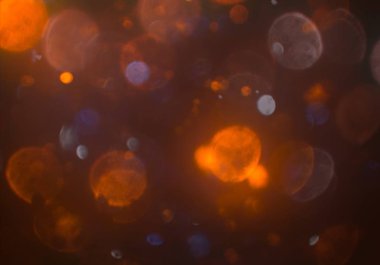 parlayan parlak bokeh toz parıltıları