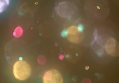 parlayan parlak bokeh toz parıltıları