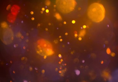 parlayan parlak bokeh toz parıltıları