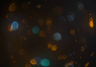 parlayan parlak bokeh toz parıltıları