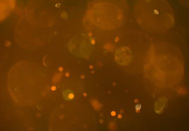 parlayan parlak bokeh toz parıltıları