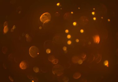 parlayan parlak bokeh toz parıltıları