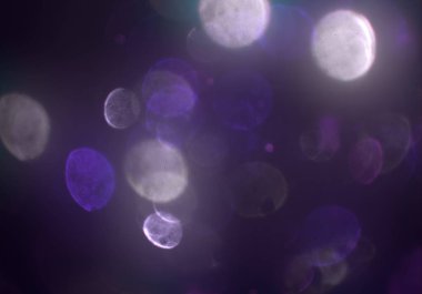 parlayan parlak bokeh toz parıltılar arka plan