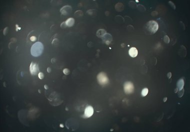 parlayan parlak bokeh toz parıltılar arka plan