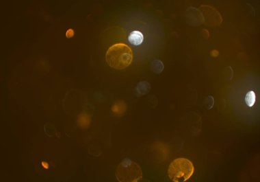 parlayan parlak bokeh toz parıltılar arka plan