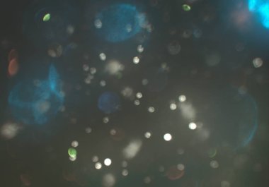 parlayan parlak bokeh toz parıltılar arka plan