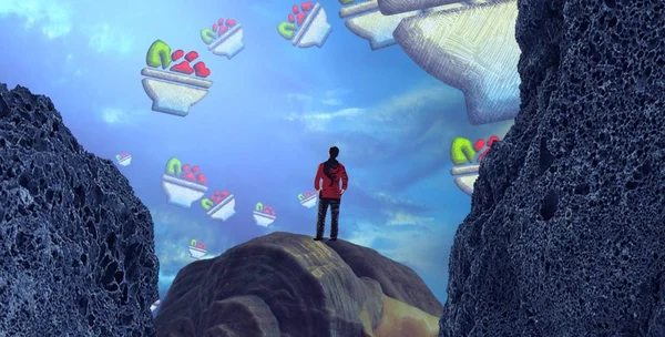 Genç bayan kayanın üzerinde oturuyor.