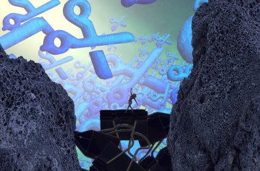 Sahilde oturan adam.