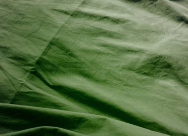 Buruşmuş parçalara sahip dokulu kumaş yüzey