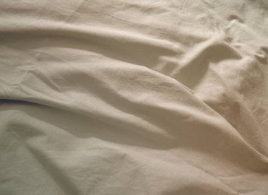 Buruşmuş parçalara sahip dokulu kumaş yüzey