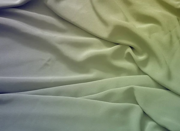 滑らかな緑のシルクの背景 — ストック写真