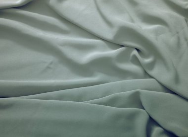 Buruşmuş parçalara sahip dokulu kumaş yüzey