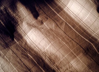 Buruşmuş parçalara sahip dokulu kumaş yüzey